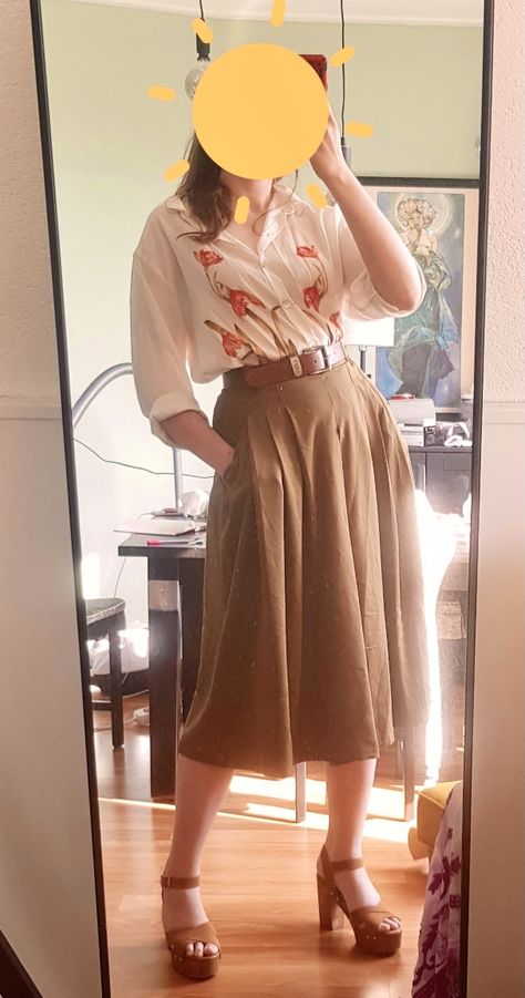 A lady standing in front of a mirror, wearing a blouse with red flowers, brown culottes with a belt, and brown leather heeled sandals. Cute Librarian Aesthetic, Minimal Cottagecore Outfits, Spring Librarian Outfit, Cottagecore Business Outfit, Fantasy Librarian Outfit, Library Core Aesthetic Outfits, Cottagecore Mom Outfits, Librarian Outfit Summer, Botanical Aesthetic Outfit