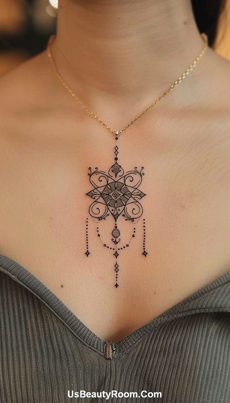 An intricate mandala design centered on the chest, perfect for those seeking a spiritual and symmetrical tattoo. Tattoos Chest Female, Tattoo On Upper Chest, Upper Chest Tattoos For Women, Small Chest Tattoo, Chest Tattoo Female Upper, Sunscreen Tattoo, Elegance Tattoo, Tattoos Chest, Collar Tattoo