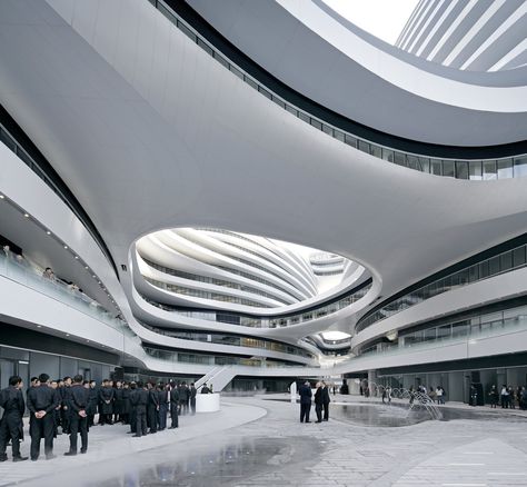 From the swooping space-age shopping mall to the Z-shaped school with a running track through it, here are the buildings that Zaha Hadid will be remembered for Galaxy Soho Zaha Hadid, Dame Zaha Hadid, Galaxy Soho, Zaha Hadid Buildings, Zaha Hadid Interior, Hadid Architecture, Zaha Hadid Architecture, Zaha Hadid Design, Rem Koolhaas