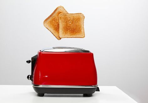 Photo two toasts jumping out of red elec... | Premium Photo #Freepik #photo #toaster #toast-bread #toast #bread-slice Electric Toaster, Bread Toaster, Toast Bread, Bread Toast, Premium Photo, Toast, Grain, Bread, Stock Photos