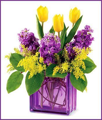 Mardi Gras Flowers VilleresFlorist.com Lavender Vase, Lila Party, Purple And Yellow Flowers, Glass Block Crafts, Easter Floral Arrangement, Tulips Spring, Easter Flower Arrangements, Spring Arrangements, Spring Floral Arrangements