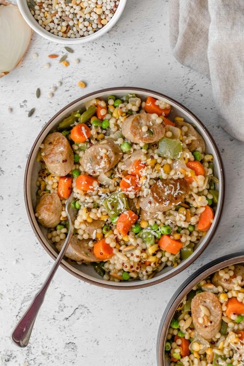 This easy One Pot Sausage and Couscous is the perfect weeknight meal. Chicken sausage, pearl couscous, and a medley of vegetables makes this dish healthy & satisfying. Customize it to your liking & the best part is that it only takes 30 minutes! Dairy free. One Pot Sausage, Pearl Couscous, Bbq Side Dishes, Sausage Dishes, Couscous Recipes, Easy One Pot Meals, Sausage Soup, Best Side Dishes, How To Cook Sausage