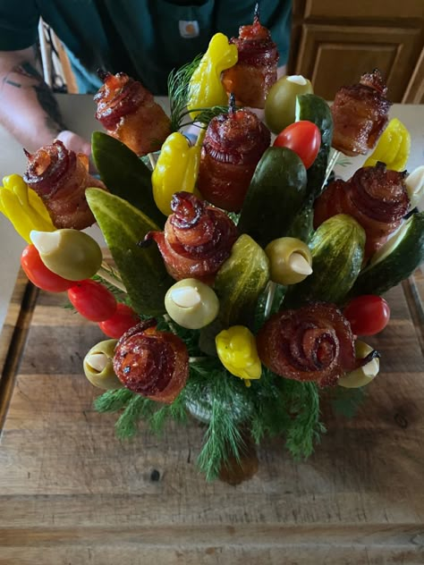 Candies bacon roses, Grillos pickle spears, pepperoncini peppers, tomatoes, and garlic stuffed olives Candies Bacon, Pickle Bouquet, Bacon Roses, Pickle Spears, Stuffed Olives, Pepperoncini Peppers, Spears, Peppers, Tomatoes