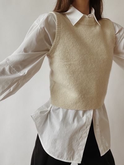 Sweater Vest Layering, Arket Wool, Layered Knitwear, Flannel Trousers, House Of Dagmar, Sweater Vest Outfit, Vest Layering, Knitwear Outfit, Parisian Chic Style