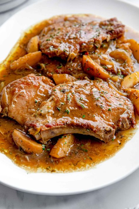 Pork Chops with Apples and Onion is a fantastic family dinner recipe. Juicy, tender meat served with lip-smacking honey apple, onion sauce. It’s made in one pan only. #jernejkitchen #porkchops #frenchonionporkchops #familydinner #onepanrecipes Caramel Slices, French Onion Pork Chops, Pork Chops With Apples, Braised Pork Chops, Family Dinner Recipe, Graham Cookies, Seared Pork Chops, Apple Pork, Apple Pork Chops