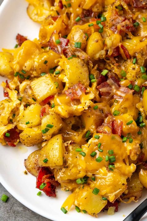 Cheesy ranch potatoes are the BEST roasted potatoes! They're tossed with zesty ranch seasoning and smoky bacon, smothered in melty cheddar. #cheesy #bacon #ranchpotatoes Best Roasted Potatoes, Cheesy Ranch Potatoes, Potato Cookies, Zesty Ranch, Bacon Ranch Potatoes, Cheesy Ranch, Ranch Potatoes, Cheesy Mashed Potatoes, Bacon Potato