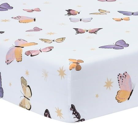 This beautiful breathable 100% cotton fitted crib sheet is on a clean white ground with a kaleidoscope of colorful butterflies. Colors include pinks, lavenders, purple, orange, and gold. There is elastic all the way around ensuring a safe and secure fit on a standard size crib mattress measuring approximately 28 X 52. Modern Nursery Themes, Butterfly Crib Sheets, Gender Neutral Nursery Design, Butterfly Nursery, Lambs & Ivy, Baby Crib Bedding Sets, Baby Crib Sheets, Girls Bedding Sets, Stylish Nursery