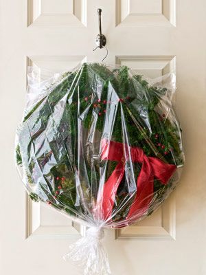 Treat wreaths with the same care you give your favorite party dress. Slip the hoop over the neck of a coat hanger, then cover with a plastic dry cleaning bag to prevent a year's worth of dust from building up. Hang in a closet or from a beam in your attic. Organized Christmas Decorations, Christmas Decoration Storage, Wreath Storage, Storing Christmas Decorations, Holiday Organization, Christmas Organization, Holiday Packing, Navidad Diy, Noel Christmas