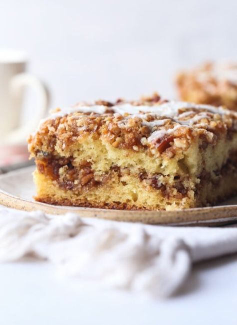 This Pecan Sour Cream Coffee Cake is an ultra moist cake with a delicious cinnamon pecan streusel baked inside and on top! Drizzle with a little icing and you have the perfect breakfast cake! #cookiesandcups #coffeecake #crumbcake #pecancoffeecake #sourcreamcoffeecake Coffee Cake Bars, Pumpkin Coffee Cake Recipes, Homemade Cheez Its, Coffee Cake Cookies, Pecan Coffee Cake, Pumpkin Coffee Cake, Breakfast Cake Recipes, Pumpkin Coffee Cakes, Sour Cream Coffee Cake