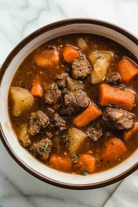 This Instant Pot Beef Stew is loaded with tender chunks of beef, carrots and potatoes in a rich and savory broth. It's quick and easy to make in the Instant Pot but tastes like it's been simmering all day long! Instant Pot Stew Recipe, Instant Pot Beef Stew Recipe, Instant Pot Stew, Sweet Potato Ground Beef, Potato Ground Beef, Instant Pot Beef Stew, Spaghetti With Ground Beef, Beef Recipe Instant Pot, Kung Pao Chicken Recipe