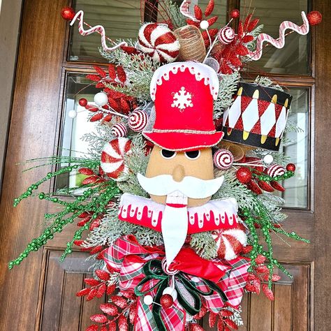 🌟 Thursday Highlight! 🌟 Get into the holiday spirit with this one-of-a-kind Nutcracker-inspired wreath! 🎅✨ Bursting with festive charm, this unique wreath features bold red plaids, glistening faux greenery, and playful peppermint accents. The whimsical nutcracker face and glitzy drum detail add a touch of magic that will make your door the talk of the season! 🎄💫 Perfect for spreading cheer, this wreath brings classic Christmas vibes with a twist. Don’t miss out—let your home shine as bright... Nutcracker Face, Whimsical Nutcracker, Unique Wreath, Faux Greenery, Christmas Vibes, The Talk, Classic Christmas, Nutcracker, Red Plaid