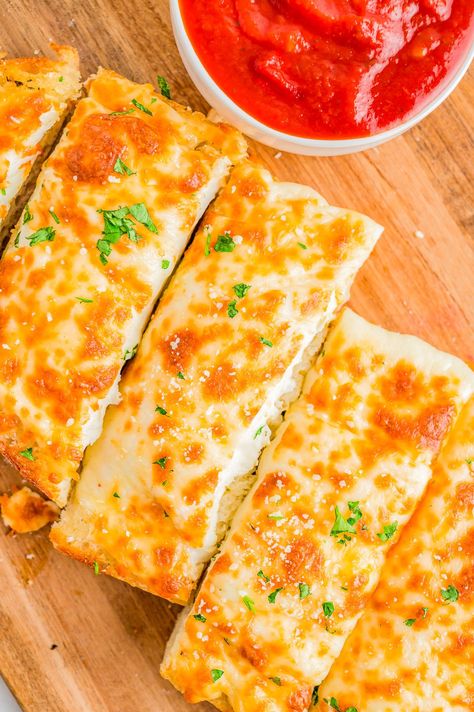 Easy Cheesy Garlic Bread - French bread that's been brushed with melted garlic butter and Italian seasoning, then topped with mounds of mozzarella and Parmesan cheeses, and baked to perfection is what this EASY appetizer, snack, or side is all about! Garlic bread with cheese is a family favorite that no one can resist and ready in just 15 minutes! Garlic Cheese Bread Recipe, Garlic Bread With Cheese, Garlic Breads, Bread With Cheese, Cheesy Garlic Bread Recipe, Bread French, Garlic Pizza, Bread Ideas, Hashbrown Casserole