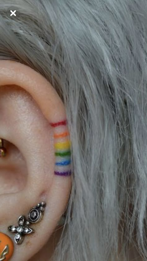 Rainbow Freckle Tattoo, Simple Queer Tattoos, Cloud Rainbow Tattoo, Pride Ear Tattoo, Rainbow Ear Tattoo, They Them Tattoo, Nonbinary Tattoo Ideas, Enby Tattoo, Pansexual Tattoo Ideas