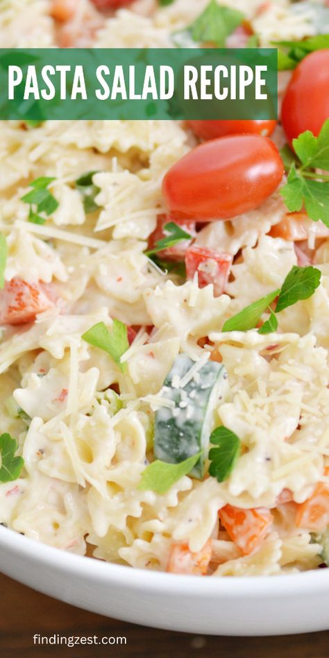 Looking for pasta salads? This easy bowtie pasta salad is a must-try! It has no mayo and a lovely flavor with plenty of fresh veggies including tomatoes, bell peppers and cucumber. A family favorite and the perfect side dish for your next picnic, bbq, potluck, 4th of July celebration or other summer gathering! Creamy Bowtie Pasta, Bbq Potluck, Bowtie Pasta Salad, Picnic Bbq, Easy Pasta Salad Recipe, Cold Pasta Salad, Cold Pasta, Pasta Salad Recipe, Summer Cookouts