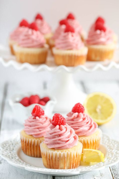 Light and moist lemon cupcakes topped with an easy raspberry buttercream frosting. These Lemon Cupcakes with Raspberry Buttercream Frosting are absolutely delicious! Lemonade Cupcake Recipe, Raspberry Lemonade Cake, Hawaii Cupcakes, Raspberry Lemonade Punch, Raspberry Lemonade Cupcakes, Raspberry Lemonade Recipe, Lemon Raspberry Cupcakes, Live Well Bake Often, Deserts Recipes