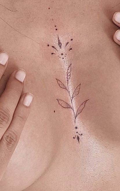 Small In Between Breast Tattoo, Below Breast Tattoo, Sternum Floral Tattoo, Middle Of The Chest Tattoo Women, Sternum Rose Tattoo, Minimalist Sternum Tattoo Women, Small Between Breast Tattoo, Vine Sternum Tattoo, Tattoo Ideas Between Breast