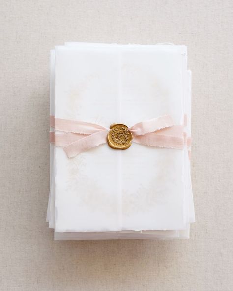 Wrapped in vellum and bound with blush silk and a custom wax seal Wax Seal With Ribbon, Capri Wedding, Pearl Invitations, Cherry Blossom Wedding Invitations, Ribbon Invitation, Vellum Wrap, Custom Wax Seal, Wax Wraps, Christening Invitation