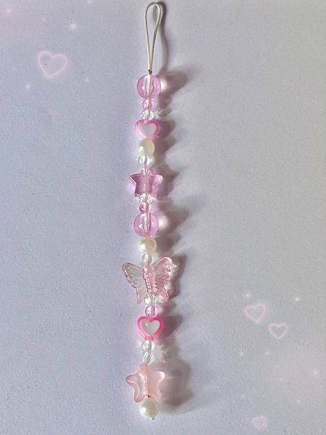 pink single phone charm! Pink Phone Keychain, How To Make Cute Phone Charms, Pink Phone Accessories, Pink Bead Keychain, Pink Beaded Keychain, Phone Charm Designs, Cute Phone Charms Diy, Bracelet For Phone, Pink Phone Charm Aesthetic