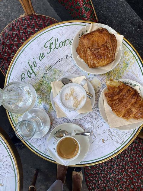 Croissant and Coffee sitting on table of Café de Flore in Paris- favorite places to eat with a view | La Vie on Grand French Dinner Parties, Where To Eat In Paris, Parisian Breakfast, Paris In April, Eat In Paris, Beef Carpaccio, Parisian Bistro, French Lifestyle, Pretty Coffee