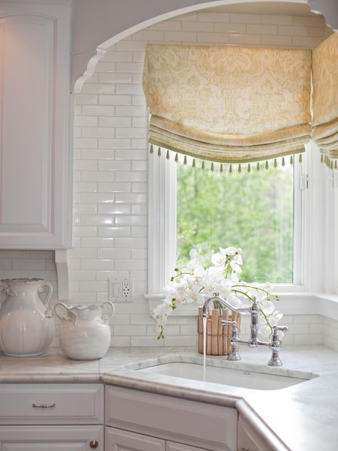 White Traditional Kitchen, Corner Kitchen Sink, Window Over Sink, Kitchen Window Valances, Kitchen Sink Window, Corner Sink Kitchen, White Tile Backsplash, Corner Kitchen, Corner Window