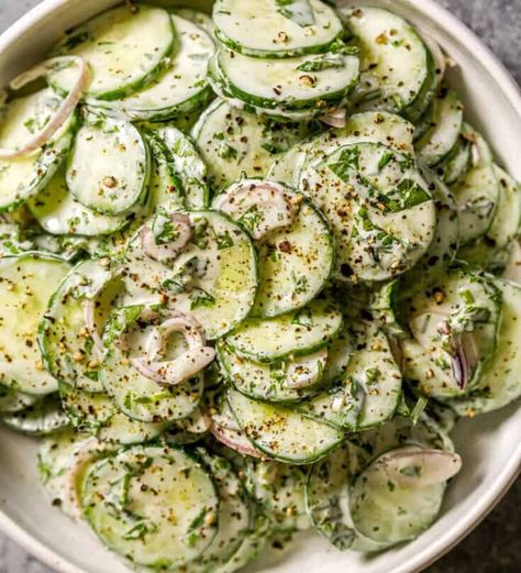 This Cucumber and Greek Yogurt Salad is a healthier take on the classic creamy cucumber salad. Herby, creamy and crisp, an easy side dish! Healthy Creamy Cucumber Salad, Cucumber Greek Yogurt Salad, Cucumber And Yogurt Salad, Cucumber Parsley Salad, Creamy Cucumber Salad With Greek Yogurt, Shaved Cucumber Salad, Cucumber Salad Greek Yogurt, Cucumber Salad With Greek Yogurt, Greek Yogurt Cucumber Salad