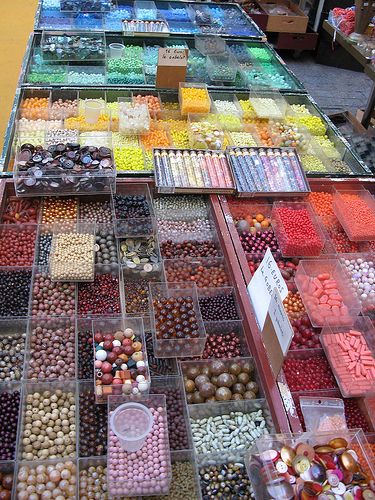 Bead Heaven at Marche Dauphine | Another vintage bead seller… | Flickr Bead Storage Ideas, Thrift Store Diy Projects, Thrift Store Diy, Bead Collection, Bead Studio, Chanel Runway, Bead Organization, Ways To Organize, Bead Storage