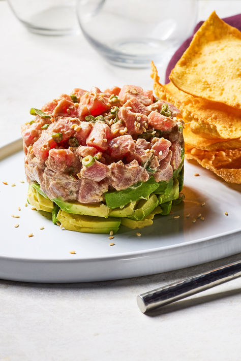 Simple yet sophisticated: Tuna tartare atop creamy avocado - a breeze to whip up! It's creamy, light, and delicious, perfect for summer gatherings.  #TunaTartare #SummerEats #WessonCanolaOil Tuna Tartare Avocado, Avocado Tartare, Tuna Tartare Recipe, Tuna Tartare, Tuna Avocado, Food Eating, Summer Gathering, Canola Oil, New Recipes