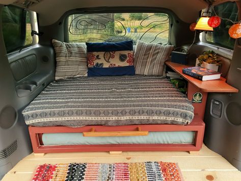 Van With Bed In Back, Living In Minivan, Crafts With Old Clothes, Mini Van Camper Conversion, Mini Van Conversion Minivan Camping, 4runner Living, Dodge Caravan Camper Conversion, Van Camping Minivan, Small Campervan Interior