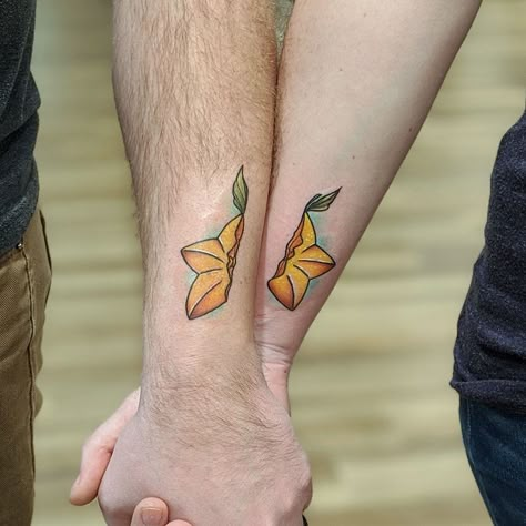 Cute matching couple tattoos of paopu fruit. Tattoos done by Emi Lee Hollinger. #paopufruittattoo #paopufruit #emileehollingertattoo #iowatattoo #tagtheqc #coupletattoos #davenportia #midwesttattoos Matching Kingdom Hearts Tattoos, Kingdom Hearts Couple Tattoo, Kingdom Hearts Paopu Fruit Tattoo, Video Game Couple Tattoos, Paopu Fruit Kingdom Hearts, Paopu Fruit Tattoo, Zelda Couple Tattoo, Video Game Matching Tattoos, Gaming Couple Tattoos