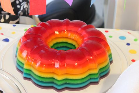 12 layer jello. I like the idea of making it in a bundt pan - I want to try this. Jello Shot Cake, Rainbow Jello Shots, Tina Colada, Rainbow Jello, Layered Jello, Kristina Webb, Jello Cake, Jello Shot, Jello Mold