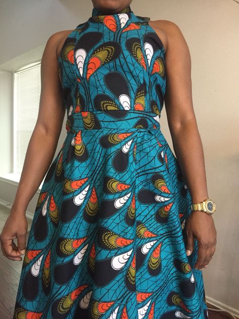 I sew Ankara dresses. High neck and full blown circle dress with high splits Ankara Halter Neck Dress, Ankara Turtle Neck Gown, Ankara Circle Dress, Long Circular Kitenge Dresses, Keyhole Neckline Ankara Dress, Collar Ankara Dress, Dresses High Neck, Long African Dresses, Circle Dress