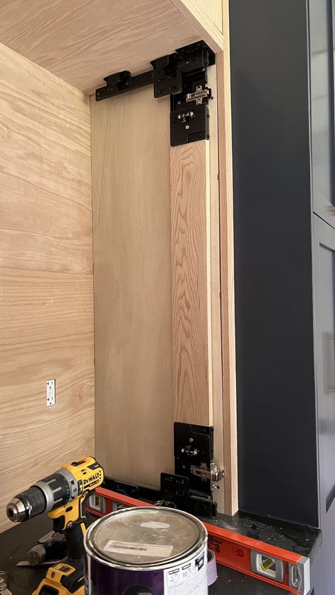 DIY Cabinet with Pocket Doors - findmaggiemay.com Cabinet With Pocket Doors, Pocket Doors Diy, Diy Pocket Door, Cabinet Building, Sliding Cabinet Doors, Bedroom Built Ins, Diy Cabinet Doors, Diy Cabinet, Wall Storage Cabinets