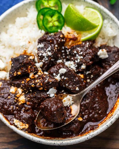 Chili Colorado is a traditional Mexican chili with chunks of beef braised in a dark red sauce of ancho, pasilla, and guajillo peppers. This incredibly flavorful dish is perfect with rice, flour tortillas, cotija cheese, and a margarita! #chili #chilicolorado #chuckroast #mexicanfood Smoky Chili, Beef Braised, Chili Colorado, Italian Beef Stew, Sip And Feast, Main Entree Recipes, Mexican Chili, Red Chile Sauce, Red Chili Sauce