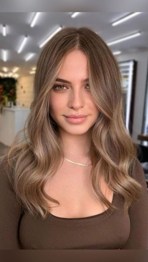 Try a darker blonde hue if you're looking for something new! Bombshell Balayage, 30 Hair Color, Dark Blonde Balayage, Blond Beige, Brown Hair Trends, Light Brown Balayage, Dark Blonde Hair Color, Color Balayage, Dark Blonde Hair