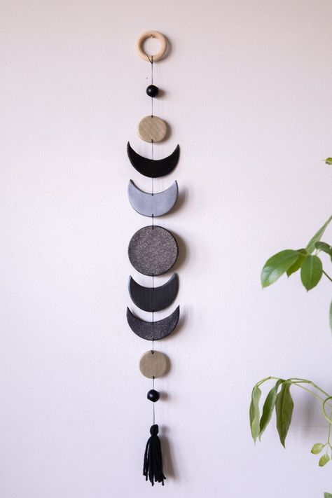 Handcrafted Polymer Clay Wall Hangings for your home. A piece that will add a little flare and color to your walls. If you have any questions or concerns, I'm happy to help best way I can! Measurements : Colors are - Black w/gold sparkle, Gray, & Gold w/gold sparkle *26in long (from top of wood ring to bottom of tassel) *3in wide * (can be longer or a little shorted if needed) *2oz in weight so very lightweight *painted wooden beads, made with polymer clay #handmadeceramics #ceramic Clay Wall Hanging, Air Dry Clay Projects, Deco Nature, Hanging Home Decor, Clay Wall, Diy Clay Crafts, Gold Sparkle, Diy Home Crafts, Diy Clay