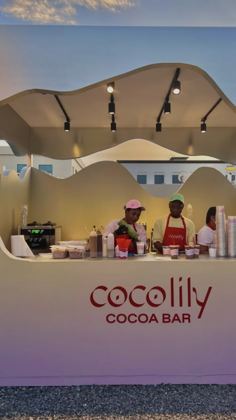 Cocolily is a chocolate brand from Dubai, which decided to expand and attract new visitors. The customer set a difficult task: it was necessary to create a temporary outdoor cafe for a month, it had to attract as much attention as possible, since this was the first major event of the brand. Also, an important aspect was the cheapness and speed of production. The design turned out to be bright, memorable and attractive, it collected a lot of likes and reposts. Coffee Shop Event Ideas, Outdoor Kiosk, Food Truck Events, Event Booth Design, Food Kiosk, Event Booth, Kiosk Design, Outdoor Cafe, Chocolate Brands