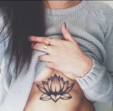 Lotus flower tattoo under breast Tattoo Under Breast, Lotusblume Tattoo, Small Lotus Tattoo, Lotus Flower Tattoo Design, Lotus Tattoo Design, Tattoos For Women Half Sleeve, Quotes Design, Sternum Tattoo, Tattoo Font