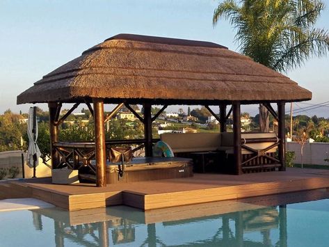 A great way to protect your spa/jacuzzi is by covering it with a thatched gazebo or waterproof pergola. This is a great way to relax, no matter what time of day or night! Outdoor Pool Ideas, Thatched Gazebo, Pool Cabana Ideas, Cabana Ideas, Sustainable Building Design, Lakehouse Ideas, Pool Cabanas, Timber Pergola, Gazebo Plans