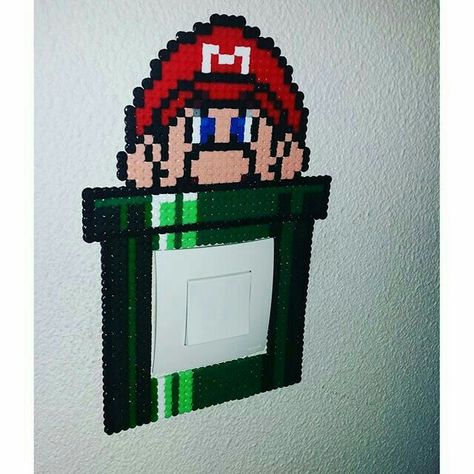 Mario perler bead light switch frame Light Switch Frame, Hama Beads Mario, Scene Kid Art, Perler Bead Mario, Modele Pixel Art, Nerd Crafts, Pastel Beads, Fusion Beads, Hama Beads Design