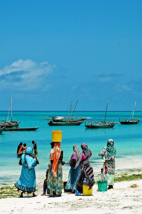 Zanzibar, Arabic for "Coast of Blacks" ~ located in the Indian Ocean 16-31 miles off the mainland of Africa,  and a part of Tanzania. Zanzibar Beaches, Magic Places, Out Of Africa, People Of The World, Africa Travel, Seychelles, Places Around The World, People Around The World, Beautiful Photography