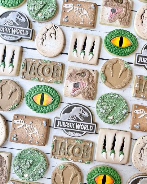 Jurrasic World Cookies, Jurassic World Cookies Decorated, Dinosaur Egg Cookies Decorated, Godzilla Cookies Decorated, Dino Birthday Cookies, Dinosaur Egg Cookies, Dinosaur Sugar Cookies Decorated, Jurassic Park Cookies Decorated, Dinosaur Sugar Cookies Royal Icing