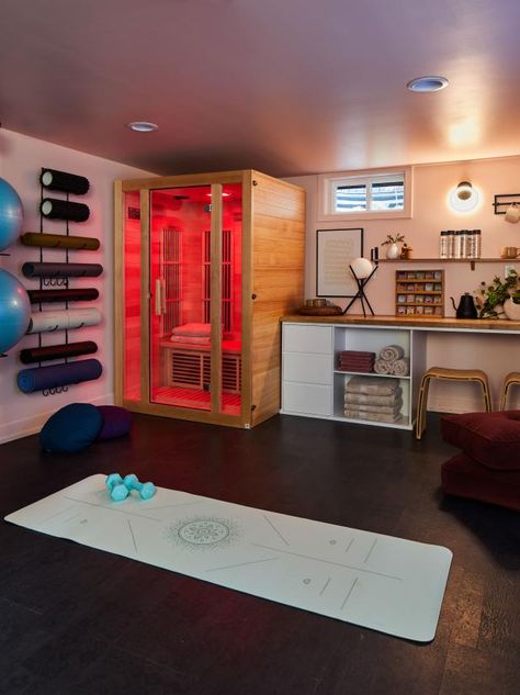 This infrared sauna generates heat as light waves and takes around 10-15 minutes to heat up, while traditional steam saunas take about an hour. An interior LED control panel and seating bench inside are two additional features of this effective post-workout recovery tool. Home Gym Goals, Attic Gym Ideas Exercise Rooms, Sauna Spa Room In House, Laundry Room With Sauna, Basement Gym Ideas With Sauna, In House Gym Ideas, Garage With Sauna, Exercise Room With Sauna, Basement Meditation Room