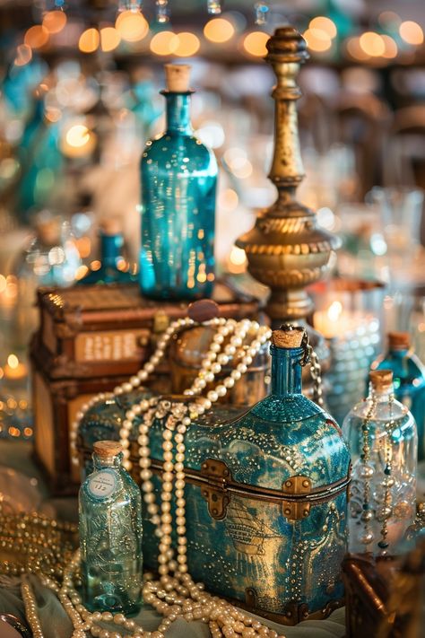 Dive into matrimonial bliss with our unique collection of nautical-themed wedding centerpieces. Think treasure chests filled with shimmering accents and bottles that whisk you away to the ocean's edge 🌊💍 Create a magical and adventurous tablescape that will enchant your guests. #WeddingInspiration #NauticalWedding #WeddingCenterpieces #TreasureDecor #BeachWeddingIdeas #RomanticWedding #UniqueWedding #TableDecor Mermaid Wedding Decor, Aquatic Wedding Theme, Treasure Chest Aesthetic, Treasure Chest Centerpiece, Mermaidcore Wedding, Under The Sea Wedding Theme, Mermaid Themed Wedding, Pirate Wedding Theme, Nautical Wedding Centerpieces