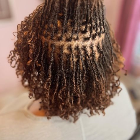 I love her locs especially with her curly ends. 🦋🦋 Currently accepting new and transfer clients. #sisterlocs #microlocs #sisterlocks #microlocks #locs #locnation #locjourney #naturalhair #locdhaircommunity #smalllocs Micro Locs, Sister Locs, Girl Braids, Flower Bomb, Sisterlocks, April 4, Naturally Beautiful, I Love Her, Lotus Flower