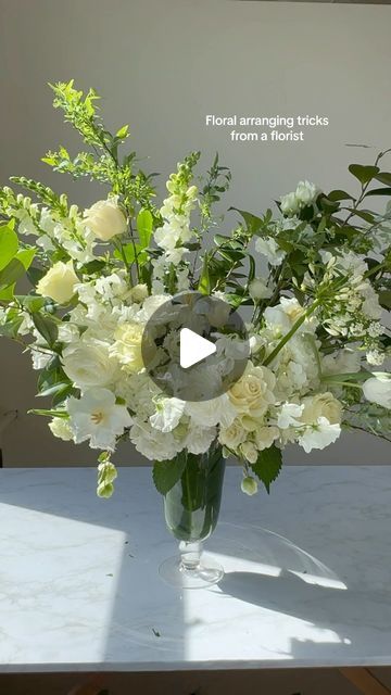 NYC Wedding and Events Florist on Instagram: "Every florist I know has their own library of tips and tricks. And they all work well. These served me well 19 years and counting:
1. Use willow branches to bend/loop to make a grid inside the vase and feel good about being more green 💚
2. My sprite + bleach combo - Video explains why
3. Woody branches and stems - split the bottom using your shears, while your shears are inside the stem twist your wrist. Watch to see how it’s done. This helps drink more water
4. Balance the blooms and let each flower breathe
5. Like share and follow for more flower arranging 🤩 

#flowerarranging #nycflorist #floristsofinstagram #spring #tulips #rachelchofloral" Diy Floral Table Centerpieces, How To Make Floral Arrangements, How To Make Flower Arrangements, How To Arrange Flowers In A Vase, Flower Arranging Videos, Flower Arragement, Diy Flower Arrangements, Nyc Florist, Tulips Arrangement