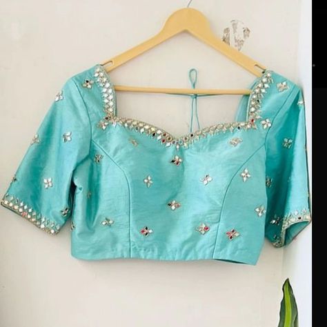 Dm@96404 90158 ## Designer Maggam Work Blouse ### Fabric Options: - Halfpattu - Raw Silk ### Dispatch Time: - Ready for dispatch in 3 days ### Pricing: - ₹1400 (Unstitched) - ₹1950(Stitched) ### Customization: - Available in various colors and sizes as per your preference Our designer maggam work blouse offers the perfect blend of traditional craftsmanship and contemporary style, ensuring you stand out at any event. Mirror Work Maggam Blouses, Work Maggam Blouses, Simple Mirror Work Blouse Designs, Simple Mirror Work Blouse, Simple Mirror Work, Maggam Blouses, Mirror Work Blouse Design, Mirror Work Blouse, Aari Designs