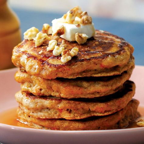 Vegetables for breakfast? You bet! These carrot cake pancakes are fluffy, slightly sweet, and full of aromatic spices. Top your stack with a pat of cream cheese, a drizzle of maple syrup, and some crunchy walnuts for a decadent start to your day! Carrot Pancakes, Brunch Bites, Carrot Cake Pancakes, Cake Pancakes, Fluffy Pancake Recipe, Breakfast Board, Breakfast Bites, Brunch Food, Tasty Breakfast