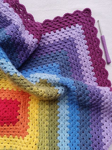 Spruce up your dorm room with these cozy crochet blanket patterns! Click to decorate! 🎓 Make your space feel like home with handmade blankets! Rainbow Granny Square Blanket, Rainbow Crochet Blanket, Boho Baby Gifts, Baby Crochet Blanket, Crochet Blanket Rainbow, Crochet Blanket Border, Granny Stripe Blanket, Cellular Blanket, Granny Stitch