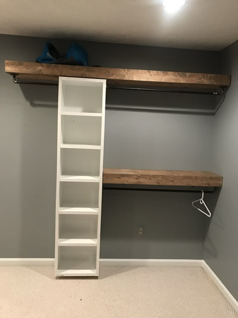 I built floating shelves for an open closet system. Floating Shelves Bedroom For Clothes, Floating Clothing Shelves, Ideas For A Room With No Closet, Walk In Closet Floating Shelves, Floating Shelves For Clothes, Small Room With No Closet Ideas, Diy Clothes Shelves, Weird Shaped Closet Ideas, Floating Closet System