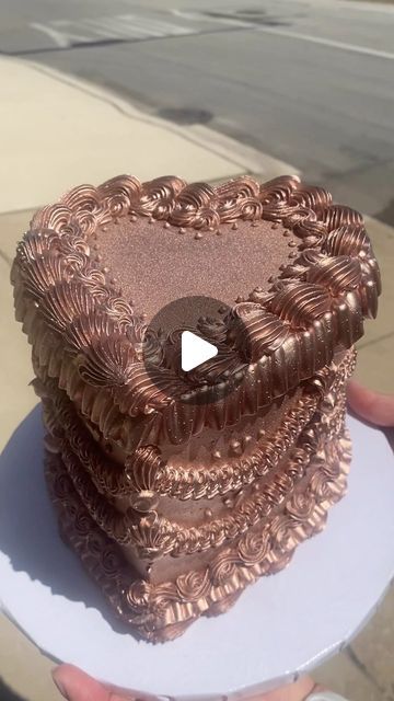 How we do our metallic cakes! 🌹  Very carefully with the airbrush! You want to make sure your buttercream is: 🌼Yellow when doing gold 🪩Grey when doing silver 🌸Pink when doing rose gold  That goes for when you’re doing metallic piping as well!  We LOVE our airbrush and use it everyday for various reasons!!  Here’s a link to the one we use! Metallic Cake, Rose Gold Cake, Aesthetic Cake, Cake Classes, Cake Studio, Just Cakes, Vintage Cake, Cake Shop, Vintage Aesthetic